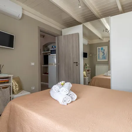 Simone Vacanze - Da Gina Таджа